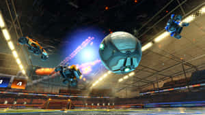 Explosive Gameplay On The Rocket League Field Wallpaper