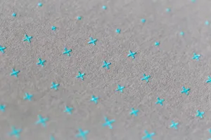 Exquisite Blue Crosses On Gray Paper Texture Wallpaper