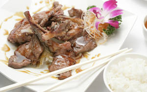 Exquisite Quail Steak With Side Dish Wallpaper