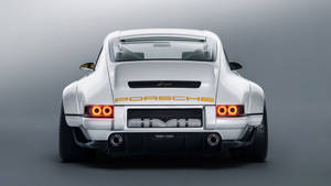 Exquisite Rear View Of A White Singer Porsche Wallpaper