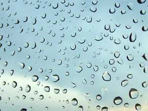 Extreme Close Up Glass Raindrops Wallpaper