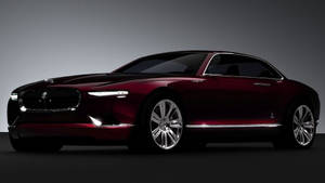 Eye-catching Dark Red Jaguar Car Wallpaper