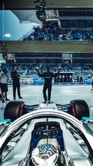 F1 Phone White Mercedes In Stadium Wallpaper