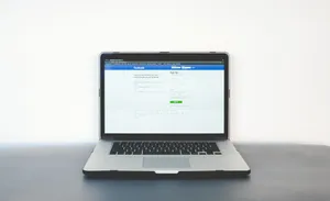 Facebook Login Page On Laptop Wallpaper