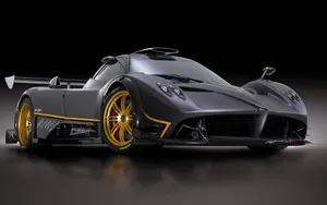 Fast And Furious Cars On A Race Track Wallpaper