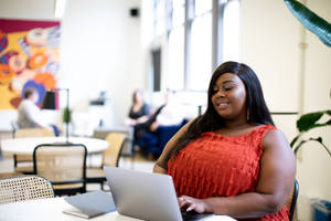 Fat Black Woman On Laptop Wallpaper