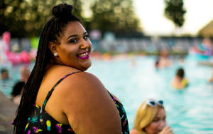 Fat Person By Pool Wallpaper