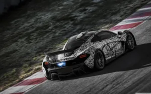 Feel The Power And Speed Of A Cool Mclaren Wallpaper