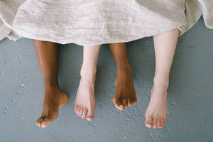 Feet With Contrasting Complexions Wallpaper