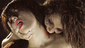 Female Vampire Biting Girl Wallpaper
