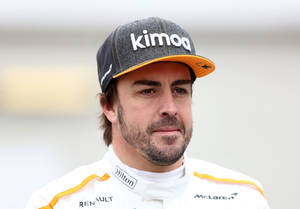 Fernando Alonso Sporting Kimoa Cap In A Close-up View Wallpaper