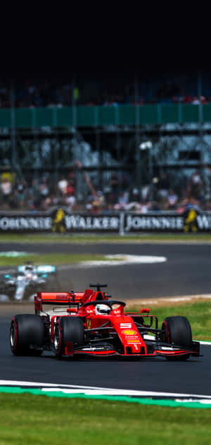 Ferrari F1 Car Ready To Take The Track Wallpaper