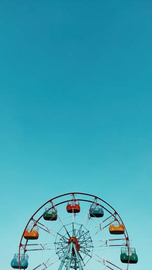 Ferris Wheel On Baby Blue Sky Wallpaper