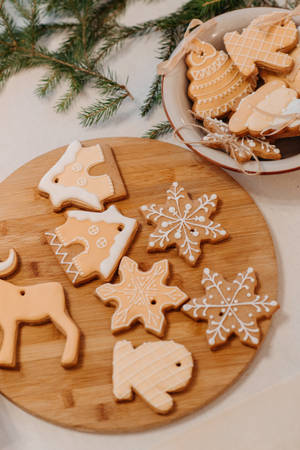 Festive Homemade Christmas Cookies On A Winter Background Wallpaper