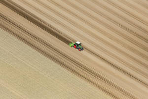 Field With Tractor Bird's-eye View Wallpaper