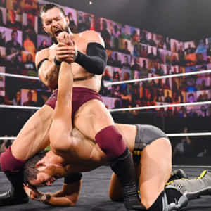 Finn Balor Defeating Enemy Wallpaper