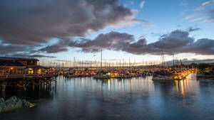 Fisherman's Wharf Under A Dark Sky Wallpaper