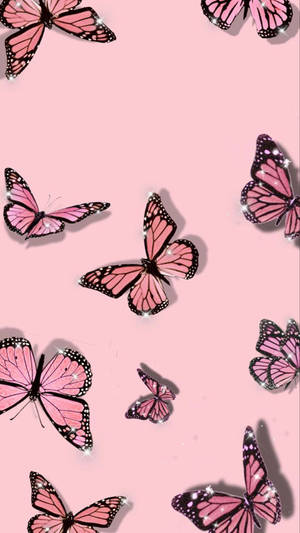 Flying Butterflies On Aesthetic Pink Wallpaper