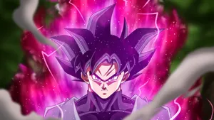 Focused Powering Goku Black Wallpaper
