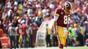 Football Player Kirk Cousins Looking Down Wallpaper