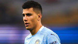 Footballer Rodri Close-up Shot Wallpaper