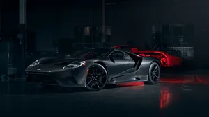 Ford Gt In A Repair Shop Wallpaper