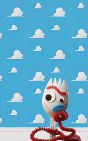 Forky Posing Against A Toy Story Cloud Wallpaper