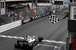 Formula 1 Race With Checkered Flag Wallpaper