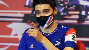 Formula One Racer Esteban Ocon Wearing A Mask Wallpaper