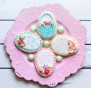 Four Cookies Decorated With Flowers And A Basket Wallpaper