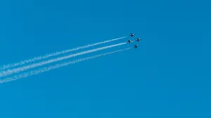 Four Fighter Jets In Plain Blue Wallpaper