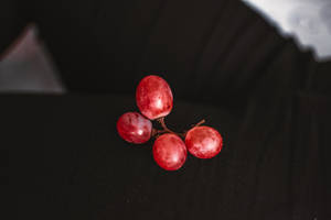 Four Red Grapes Wallpaper