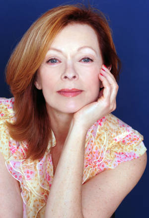 Frances Fisher On Purple Wallpaper