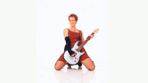 Freaky Friday Jamie Lee Curtis Playing Guitar Wallpaper