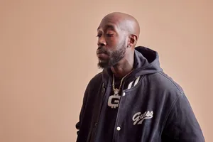 Freddie Gibbs Contemplative Look Wallpaper