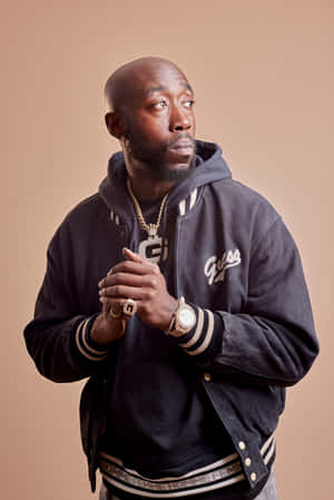 Freddie Gibbs Contemplative Pose Wallpaper