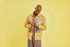Freddie Gibbs Contemplative Pose Wallpaper