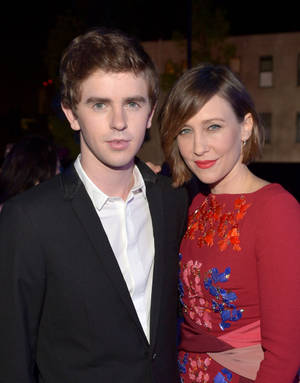 Freddie Highmore Alongside Vera Farmiga In A Classy Appearance Wallpaper