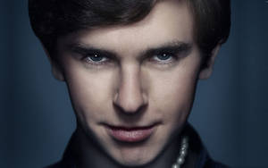 Freddie Highmore Creepy Look Wallpaper