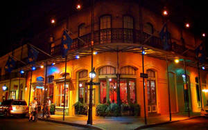 French Quarter Orange Light Establishment Wallpaper