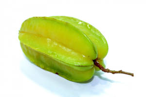 Fresh Green Star Fruit On White Background Wallpaper