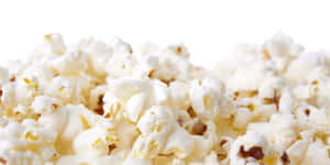 Fresh Popped White Popcorn Background Wallpaper