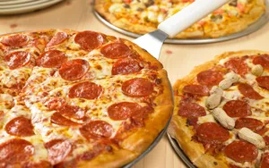 Freshly Made Pepperoni Pizza Wallpaper