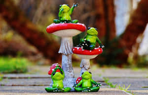 Frog_ Figurines_ On_ Mushrooms.jpg Wallpaper