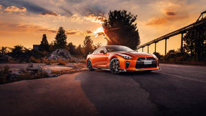 Front Facing Orange Nissan Gt R 4k Wallpaper