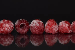 Frozen Raspberries Reflection Wallpaper
