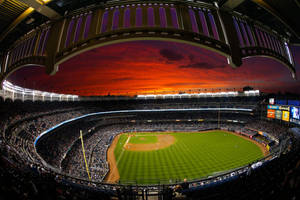 Full House Yankee Stadium At Dusk Wallpaper