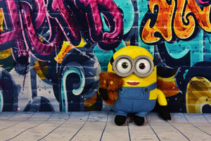 Fun-loving Minions Ready For Action Wallpaper
