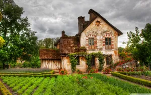 Garden Surrounding A Farmhouse Desktop Wallpaper