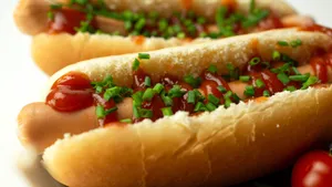 Garnished Hot Dogs Closeup Wallpaper